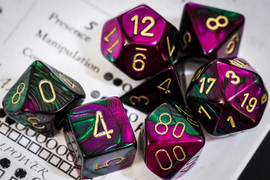 Green And Purple Polyhedral Dice
